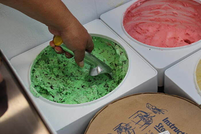 Scooping Bedre mint chocolate chip ice cream at the Artesian Hotel