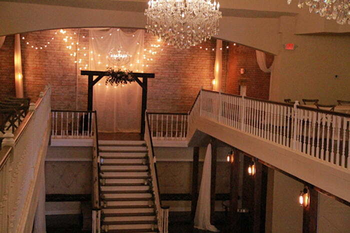 Wedding venue stairs and chandelier at Grand Canadian Theater in Purcell Oklahoma