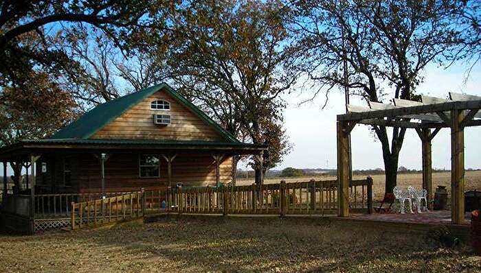 Cozy log cabin exterior in Chickasaw Country Oklahoma