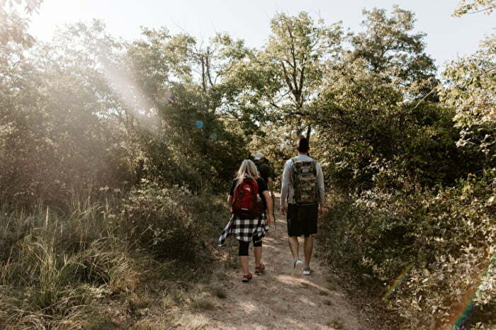 Couple hiking on a trail in Chickasaw Country